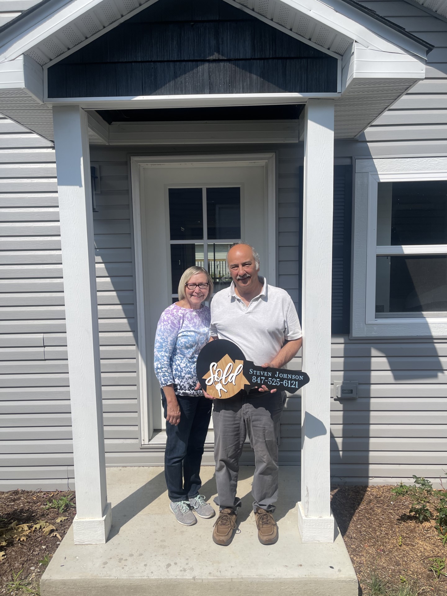 Steven Johnson, an Antioch real estate agent with Coldwell Banker, helped these two home buyers secure the perfect lake house in Antioch.